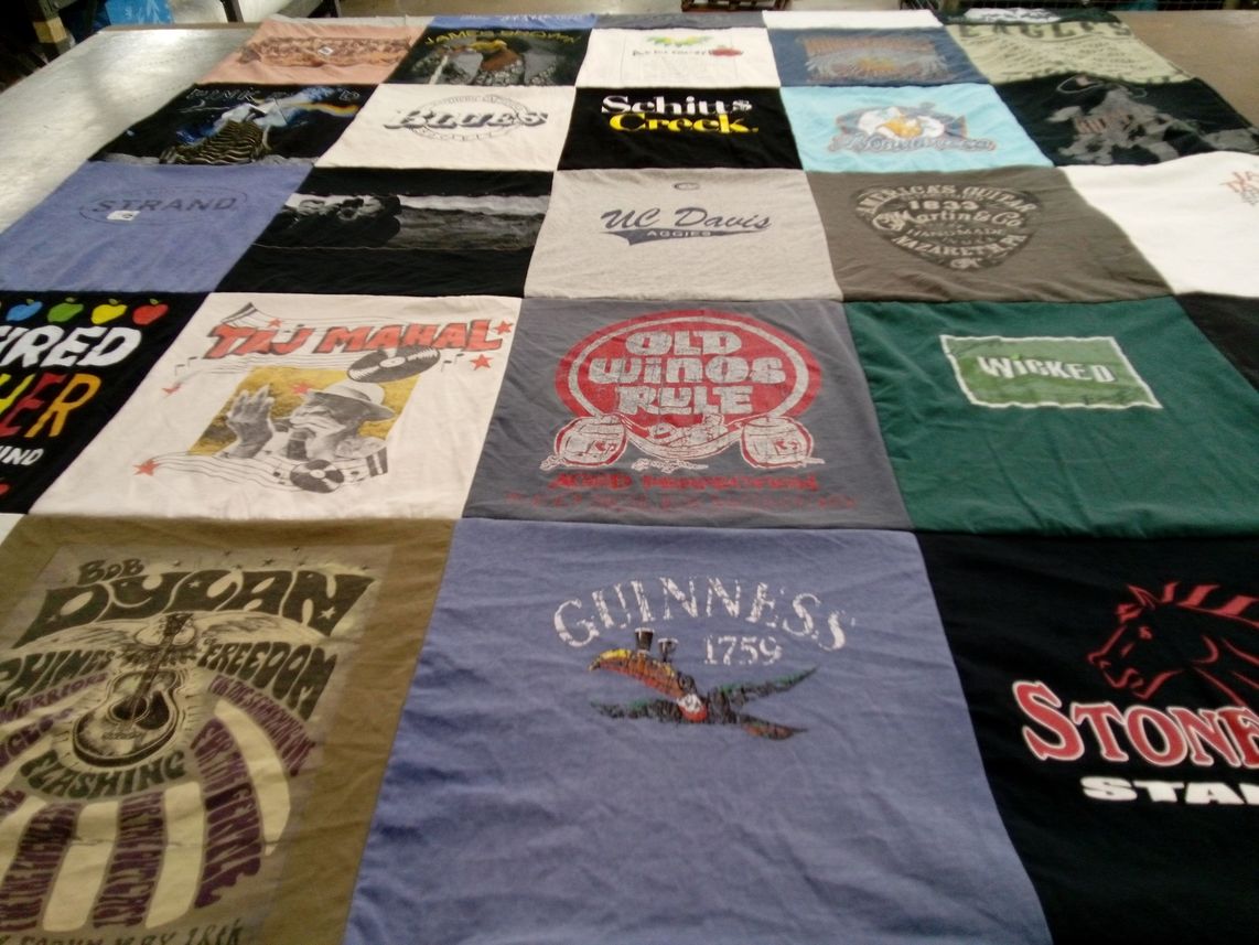 T-shirt quilt with music, art themes by Debra from CA