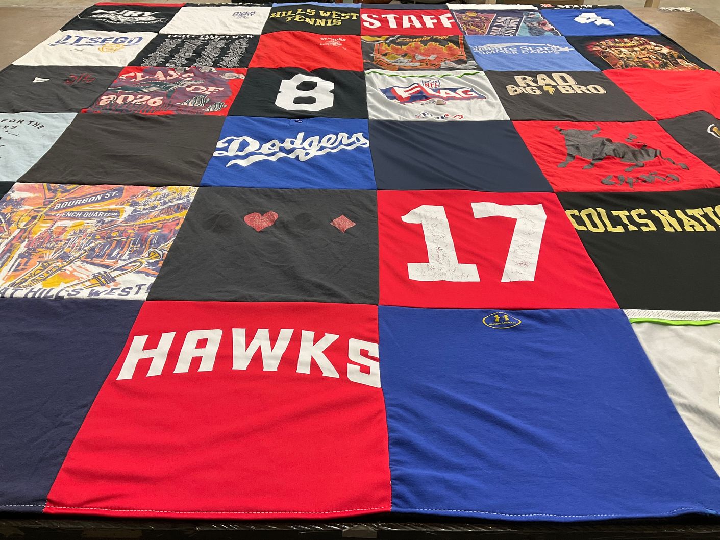 T-shirt quilt with sports themes by Rachna from NY