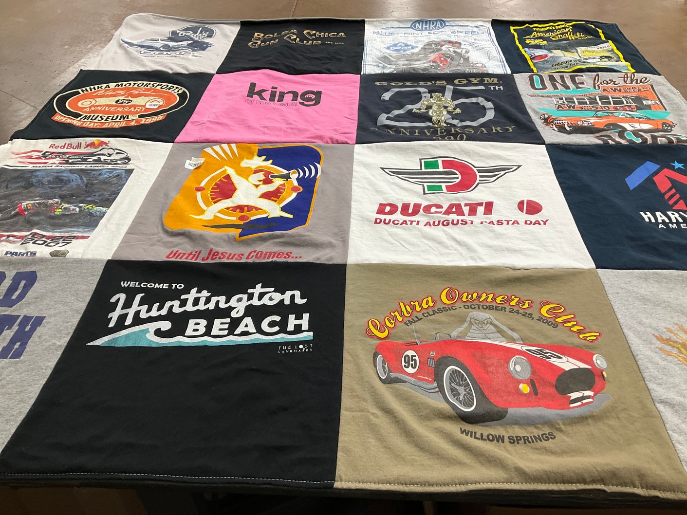 T-shirt quilt with motorsports, fitness themes by Christine from CA