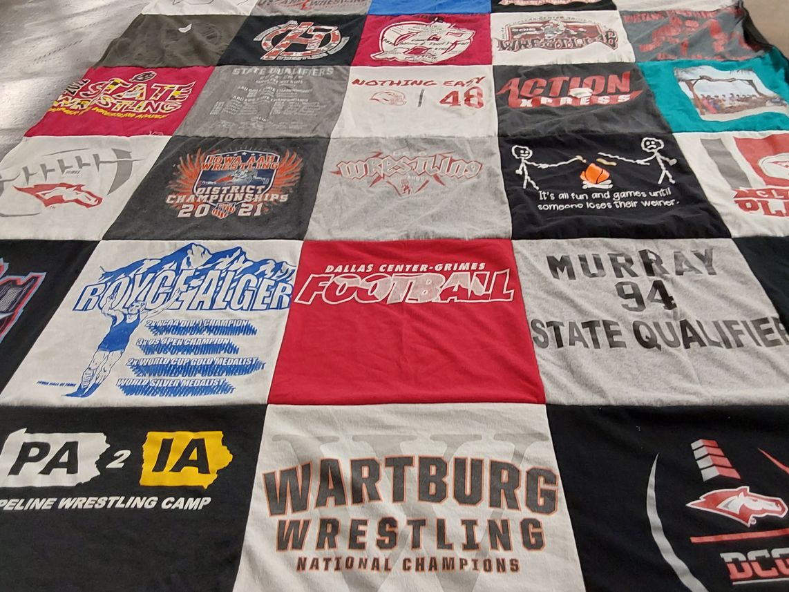 T-shirt quilt featuring dallas center-grimes high school football, wartburg college wrestling by Amy from IA