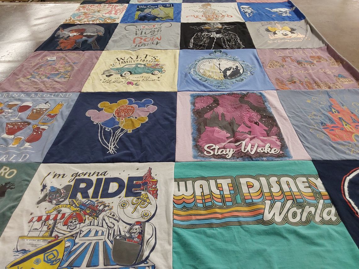 T-shirt quilt with disney, travel themes by Erin from FL