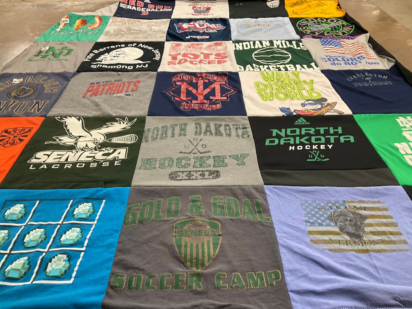 T-shirt quilt featuring new england patriots, north dakota hockey by Brittany from MN