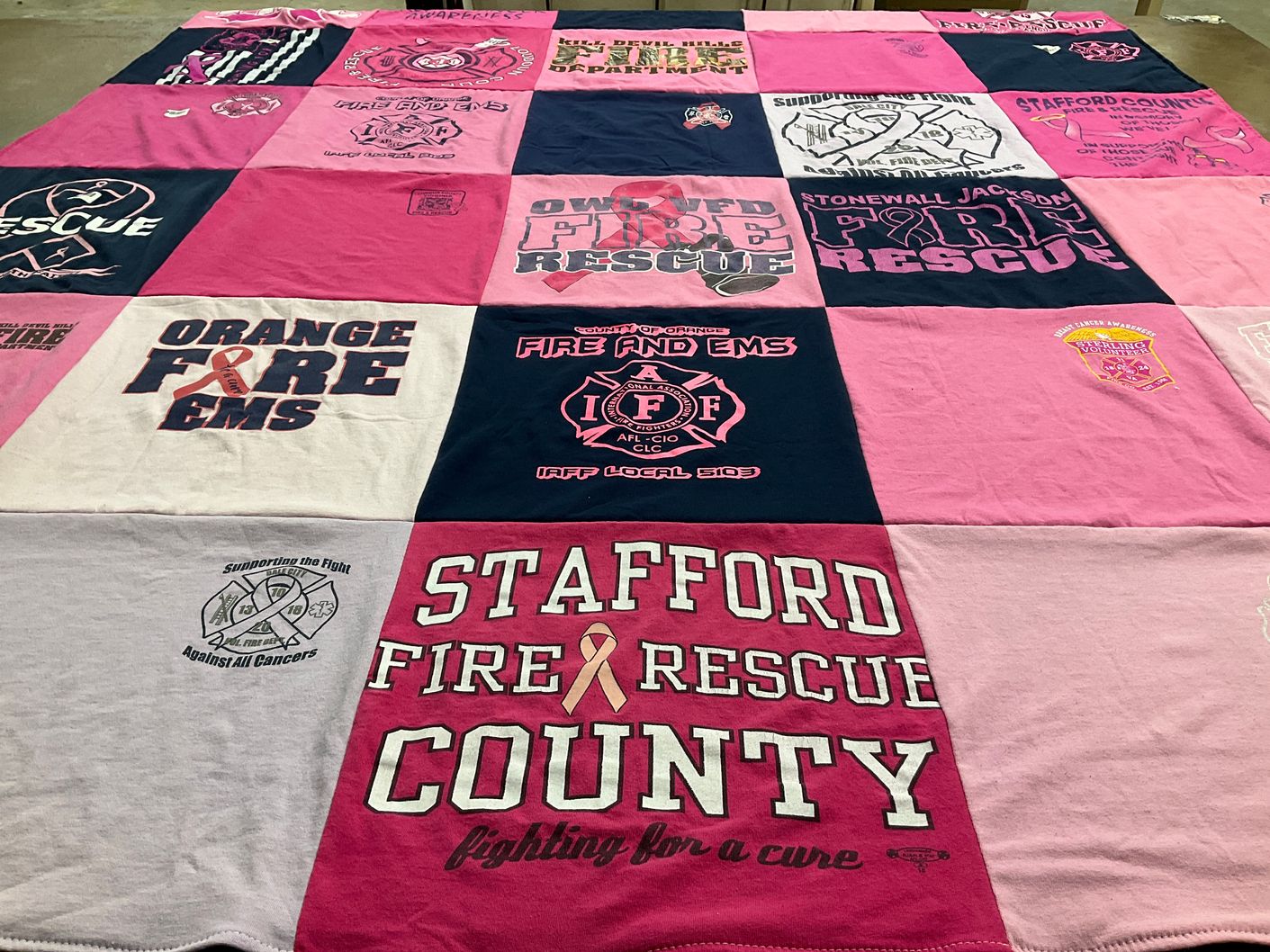 T-shirt quilt with fire rescue, emergency services themes by Jennifer from VA