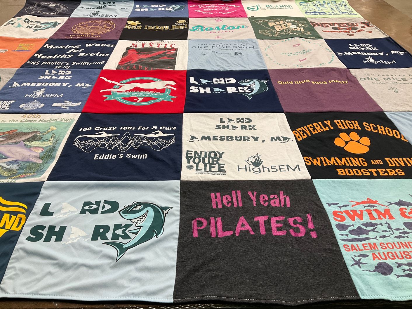 T-shirt quilt featuring land shark swim team by Andrea from MA