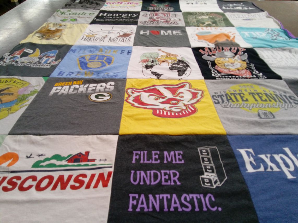 T-shirt quilt featuring green bay packers, milwaukee brewers by Chandra from WI