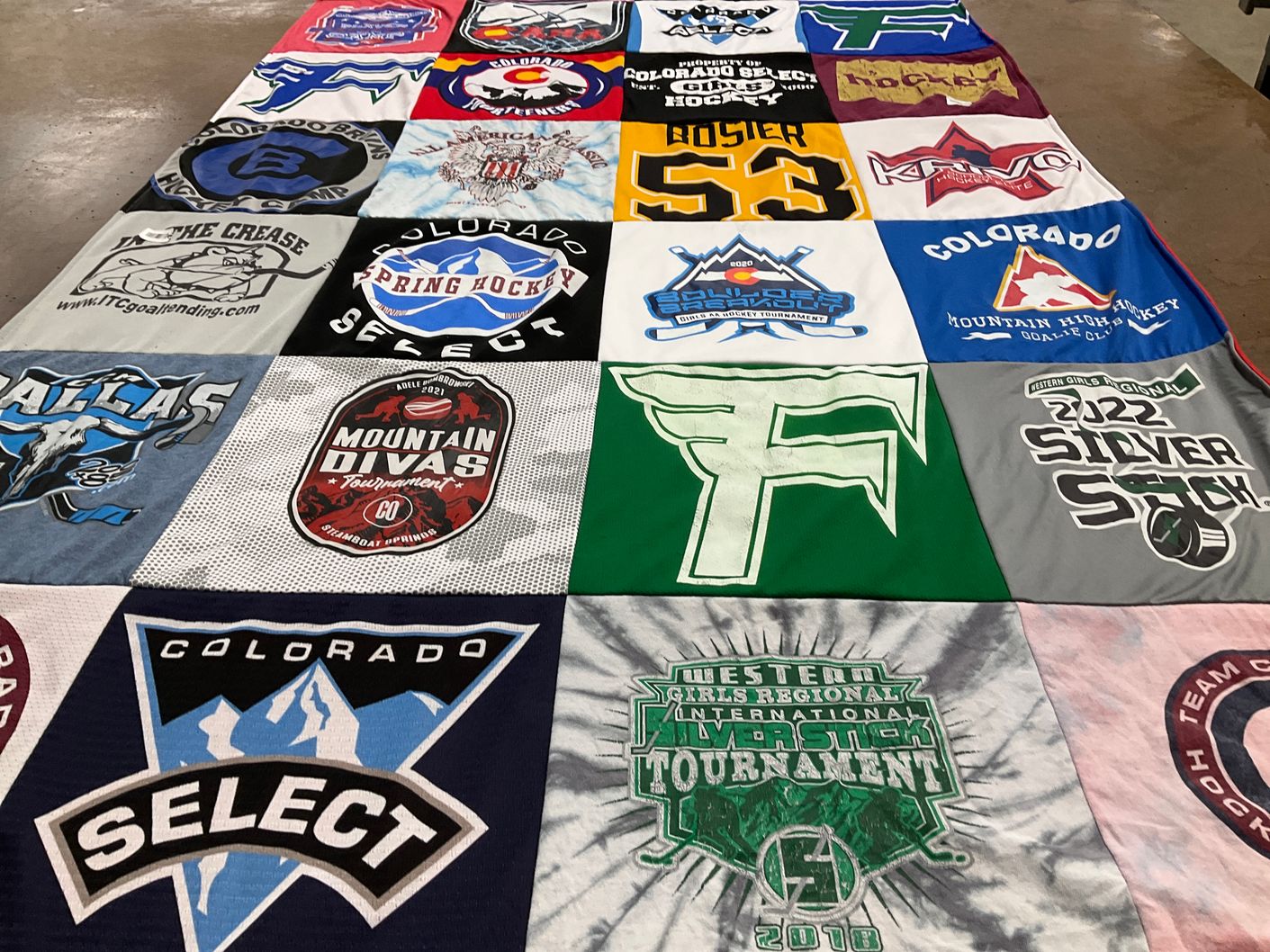 T-shirt quilt with hockey, sports themes by Jennifer from CO