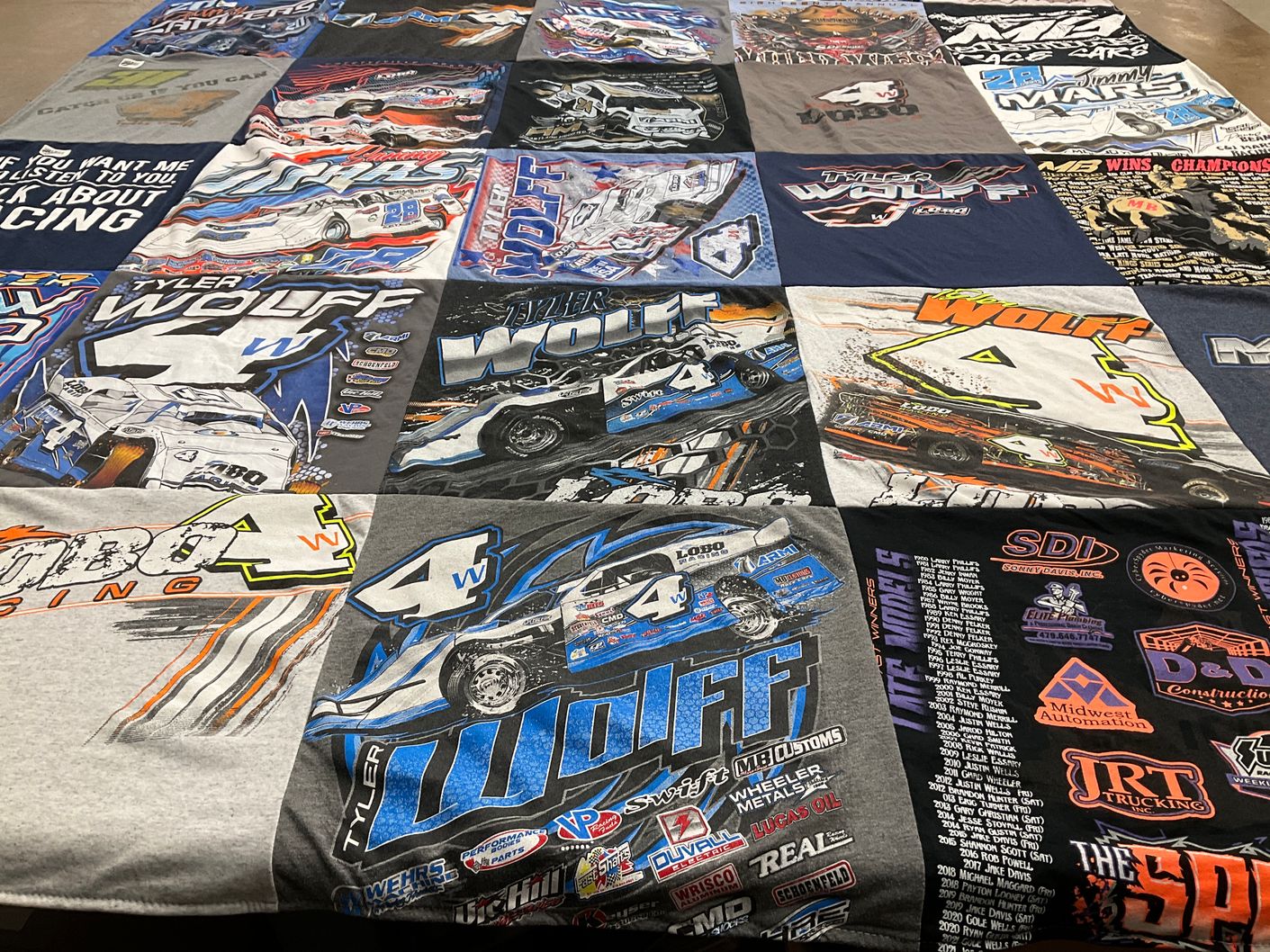 T-shirt quilt with auto racing, motorsports themes by Kinlee from AR