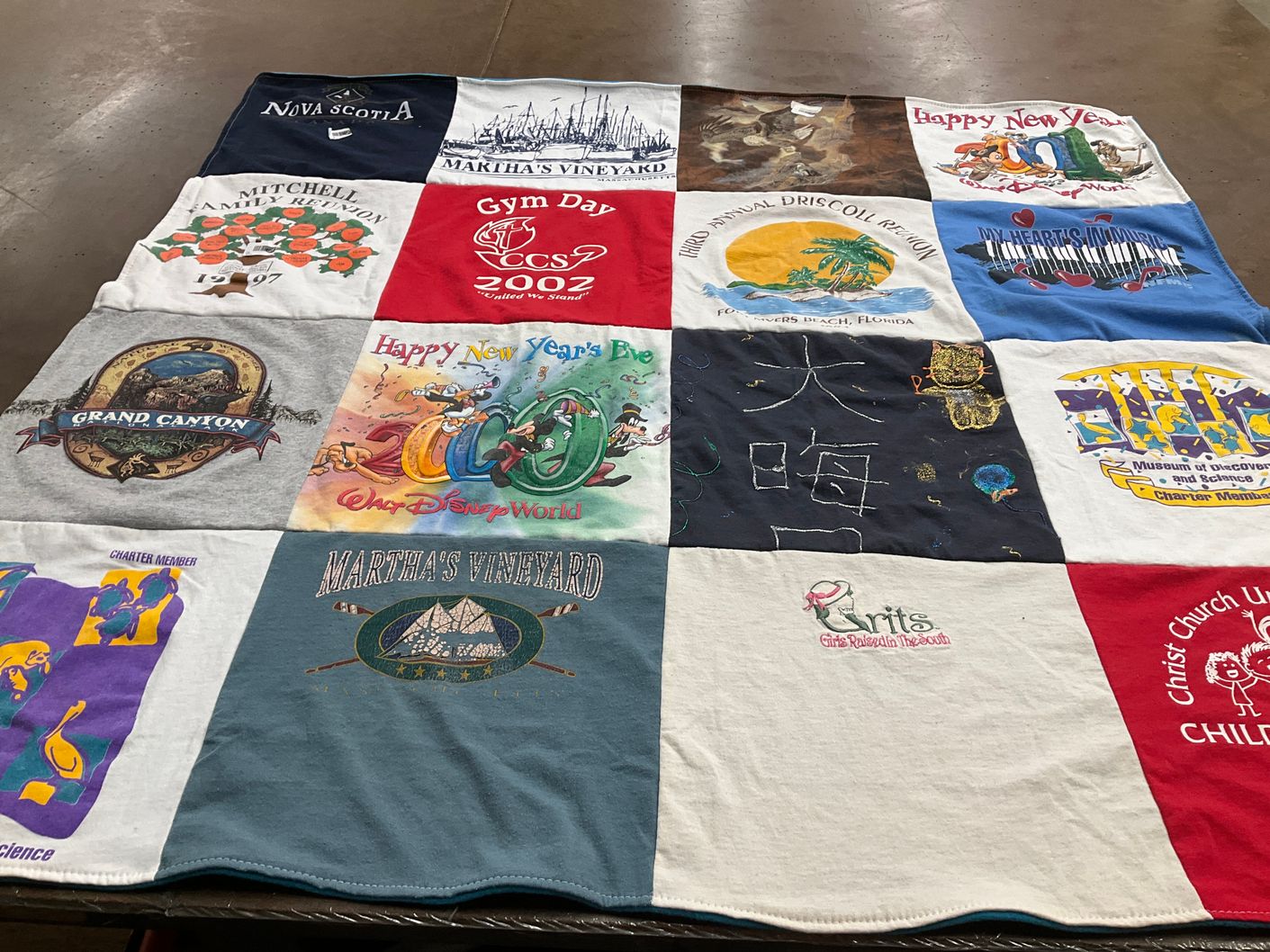 T-shirt quilt with travel, family themes by Barbara from FL