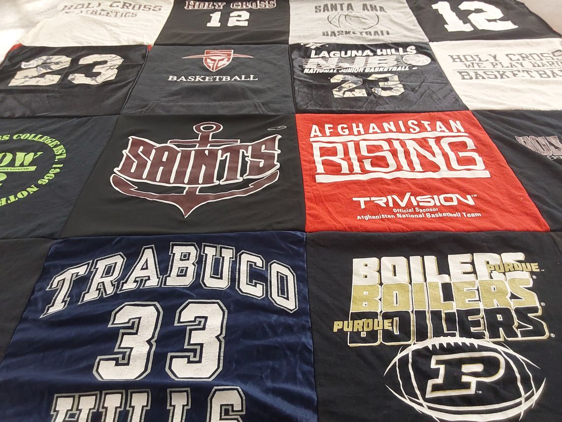 T-shirt quilt from holy cross college, laguna hills high school by Yama from CA