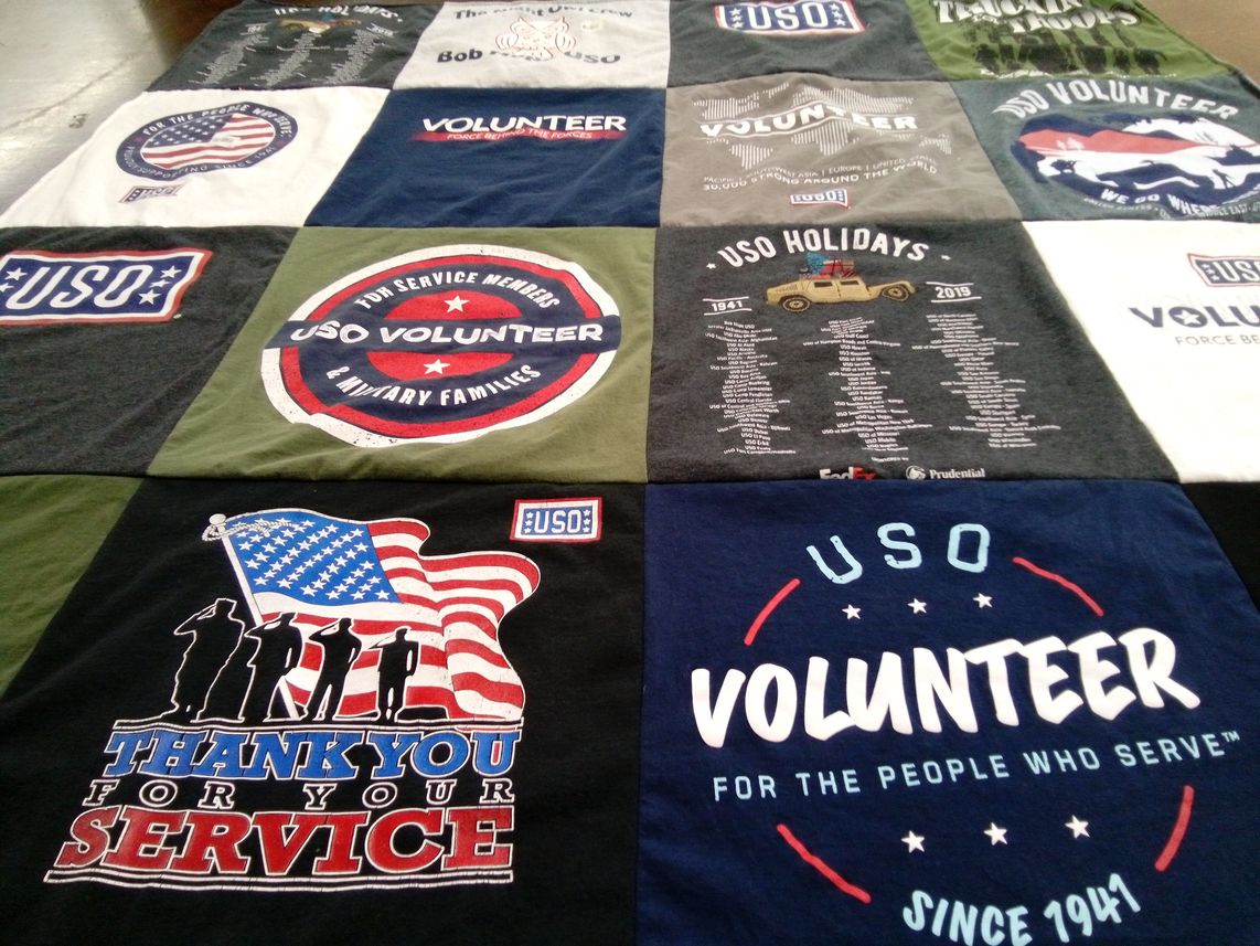 T-shirt quilt with volunteering, supporting military families themes by Mariza from CA
