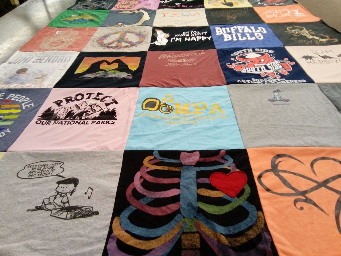 T-shirt quilt with environmentalism, music themes by mariann from NY