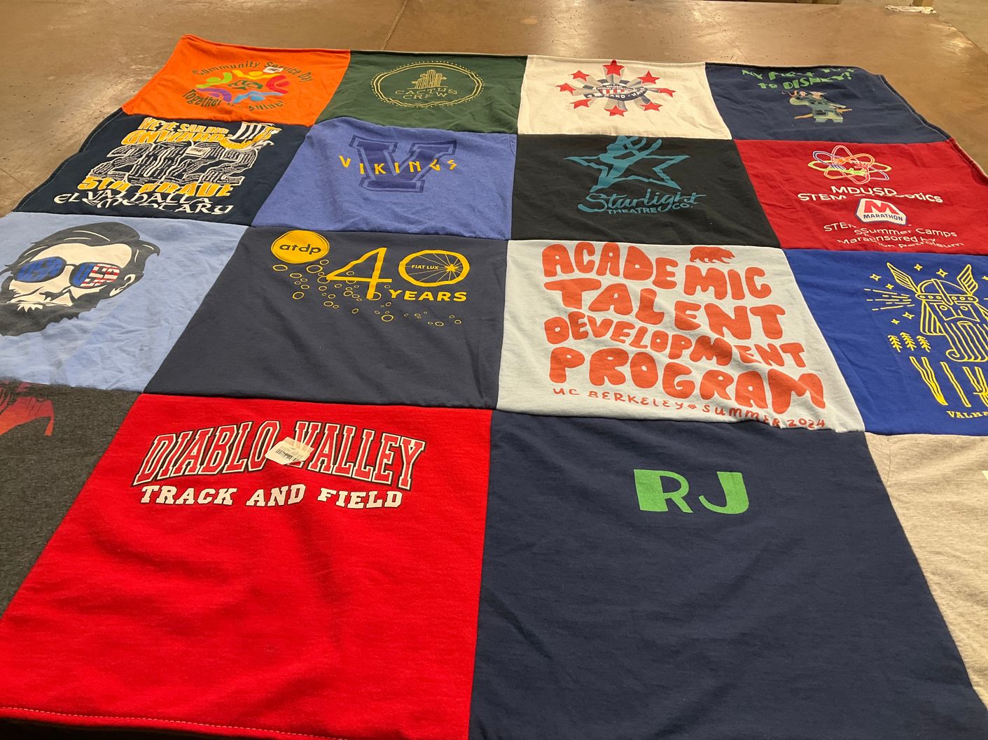 T-shirt quilt featuring diablo valley college track and field by Christine from CA