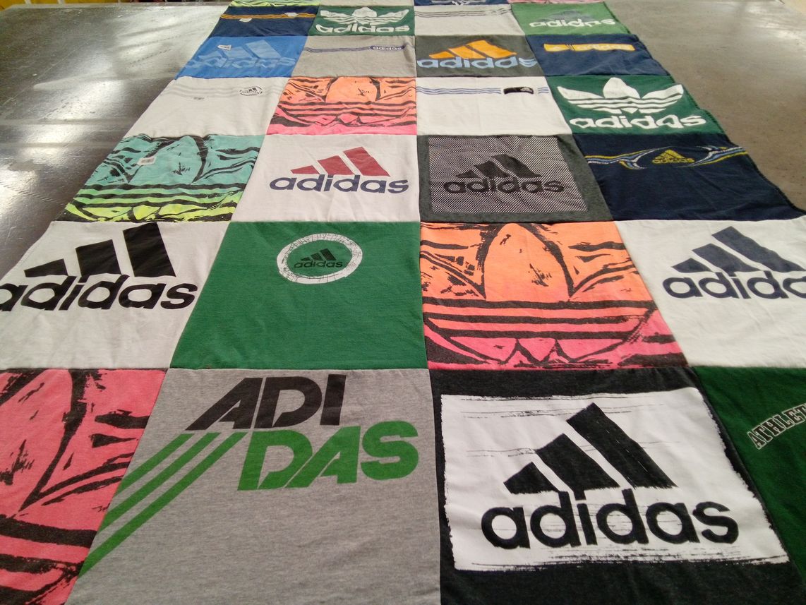 T-shirt quilt with sports, fashion themes by Abby from PA