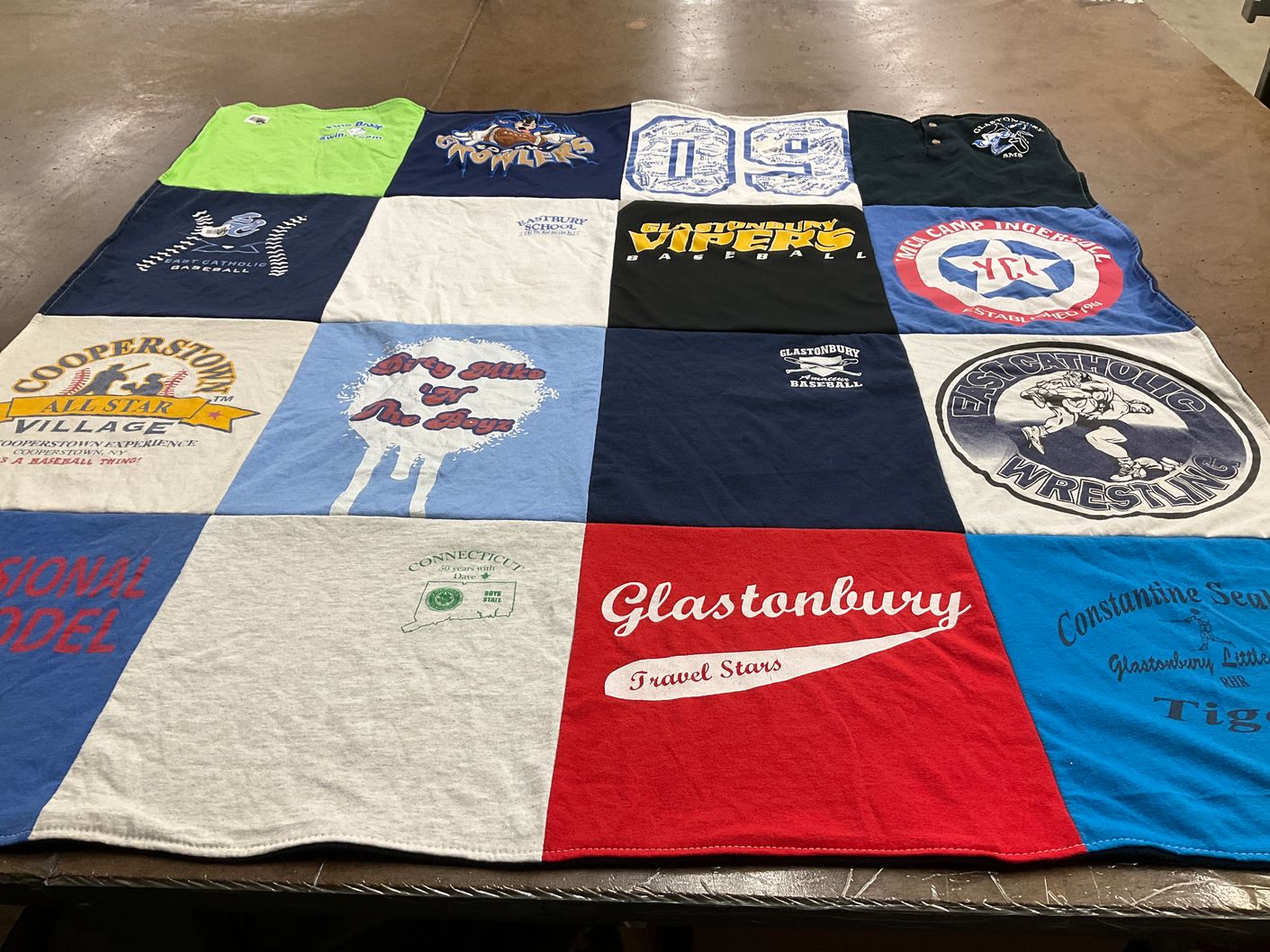 T-shirt quilt featuring glastonbury high school baseball, eastern connecticut state university wrestling by Bernadette from CT