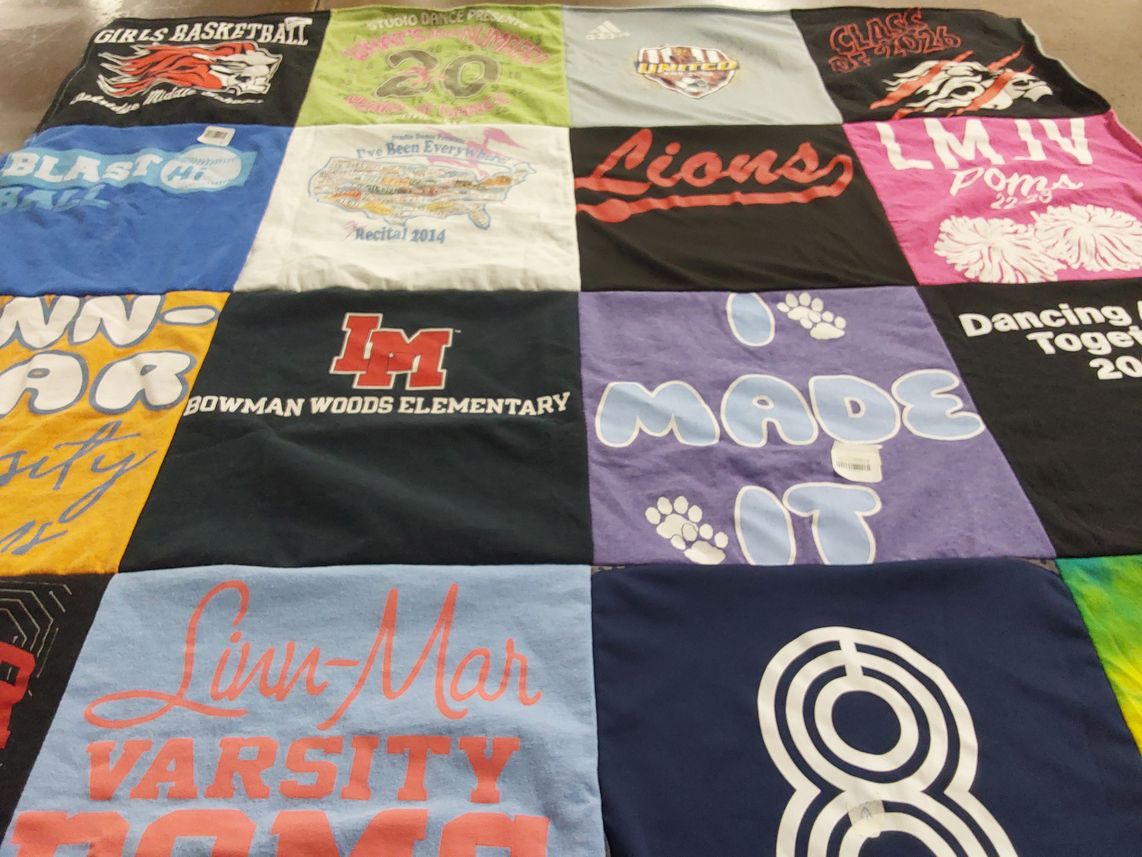 T-shirt quilt featuring linn-mar varsity pom squad by Layce from IA
