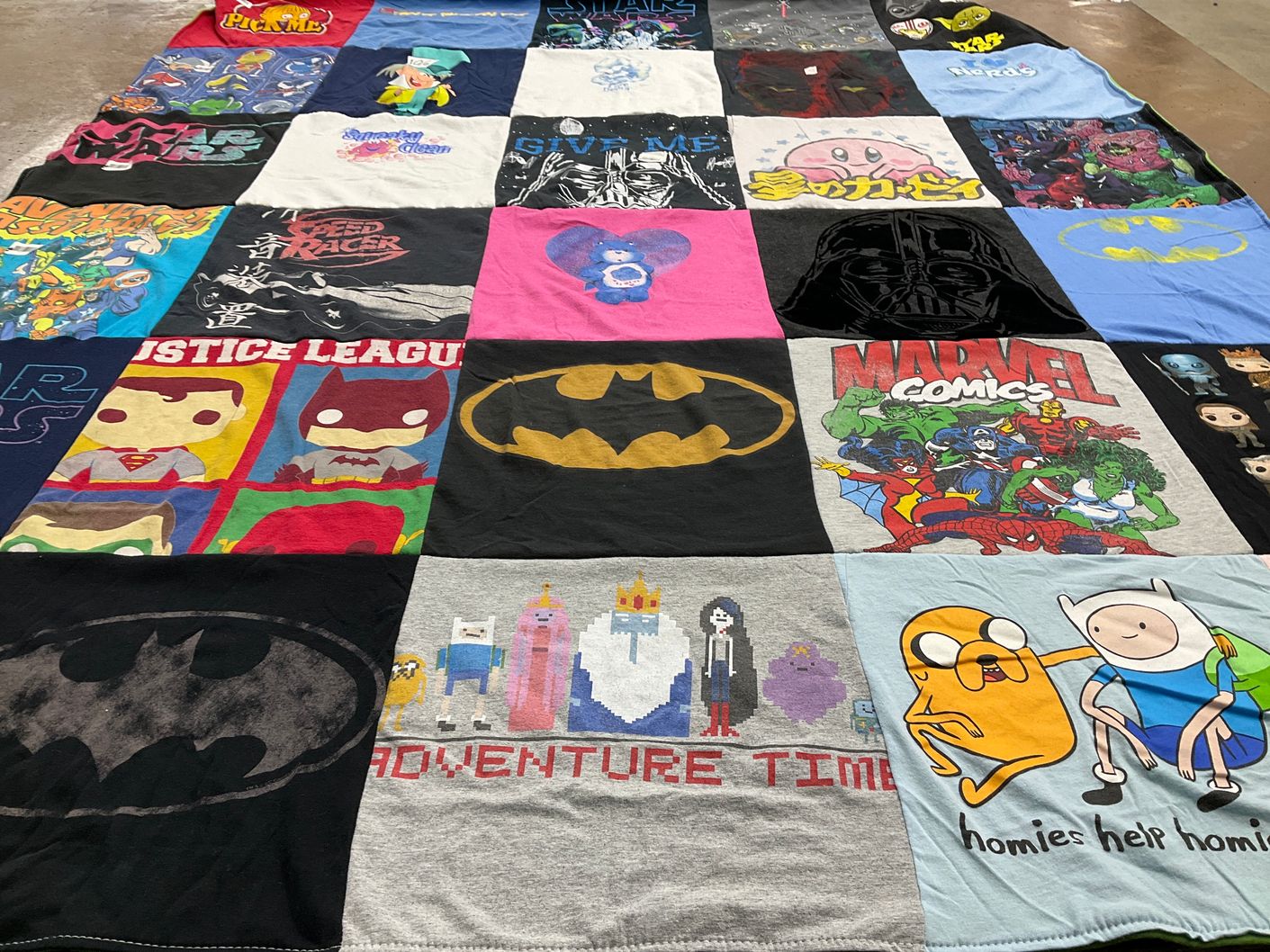 T-shirt quilt with superheroes, cartoons themes by Margaret from WV