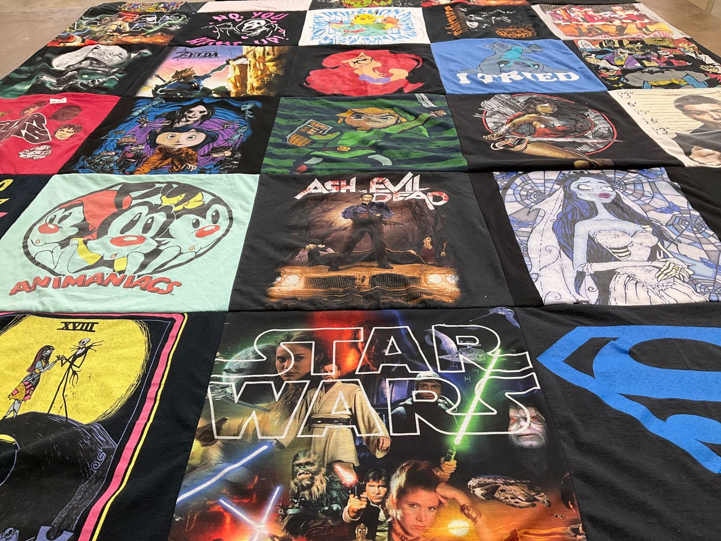 T-shirt quilt with cartoons, movies themes by Letisia from IL