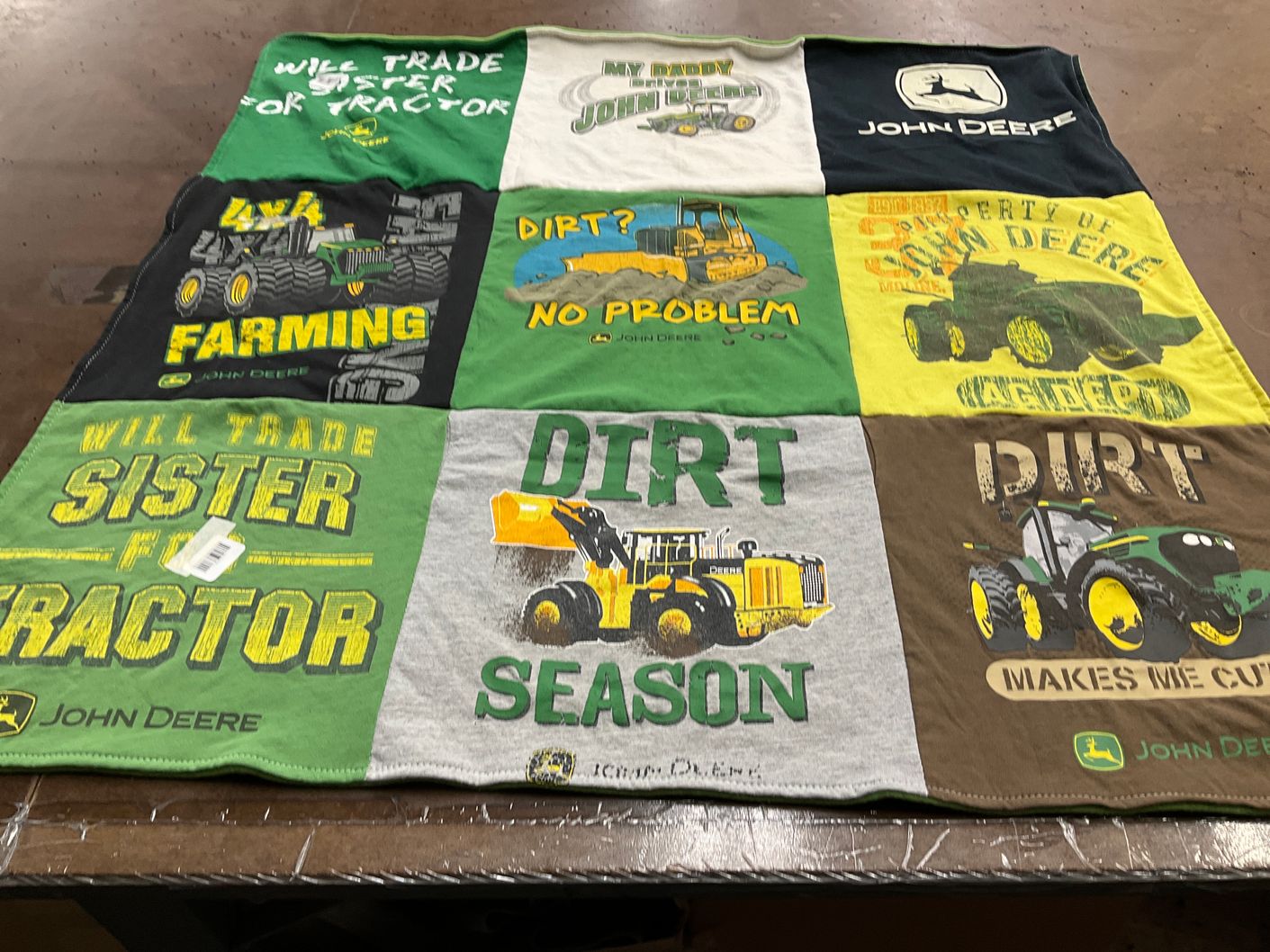T-shirt quilt with farming themes by Amanda from IL