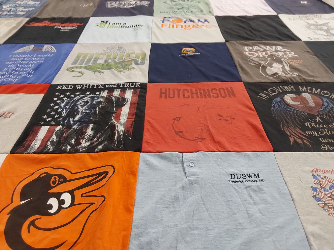 T-shirt quilt with animals, memory themes by Cindy from MD