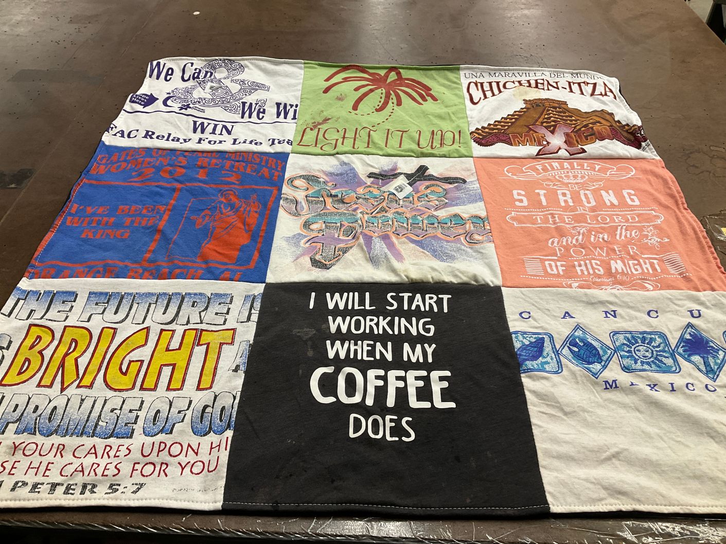 T-shirt quilt with travel, coffee themes by Charmayne from AL