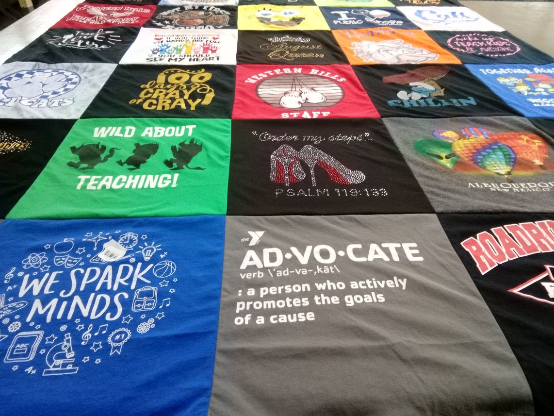 T-shirt quilt with education, teaching themes by Linda from TX
