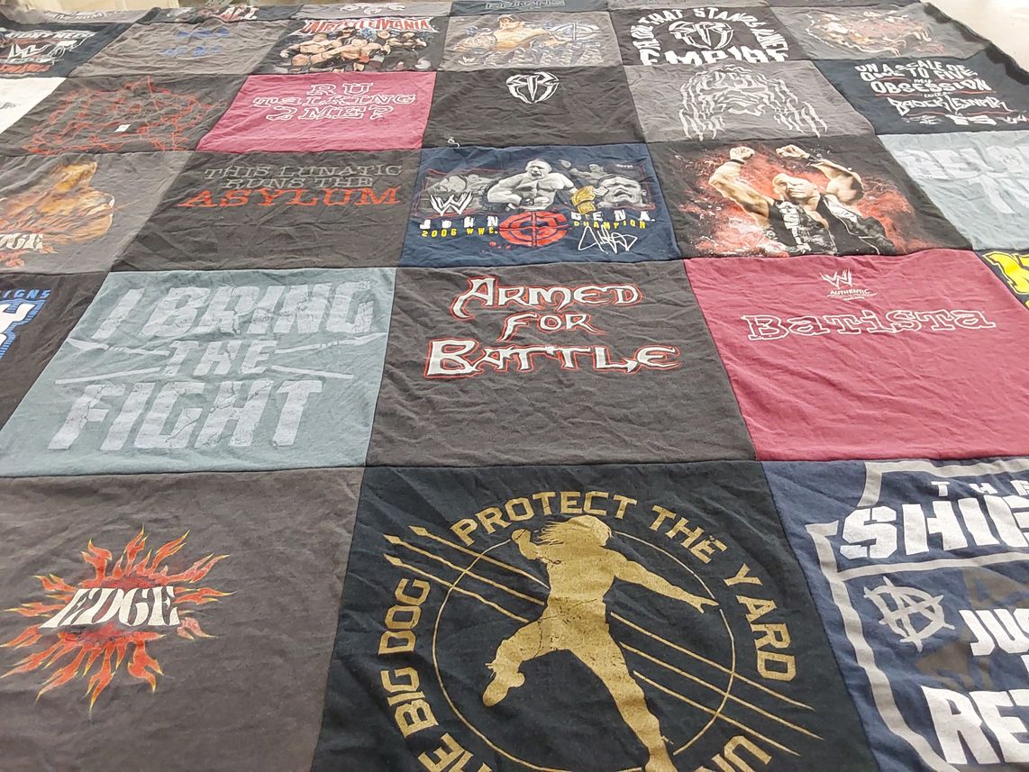 T-shirt quilt with wrestling themes by THERESA from KS