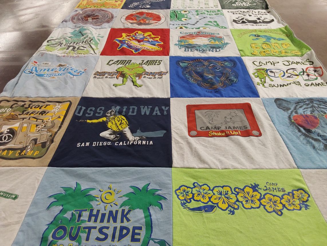 T-shirt quilt with camping, outdoor activities themes by Kristin from CA