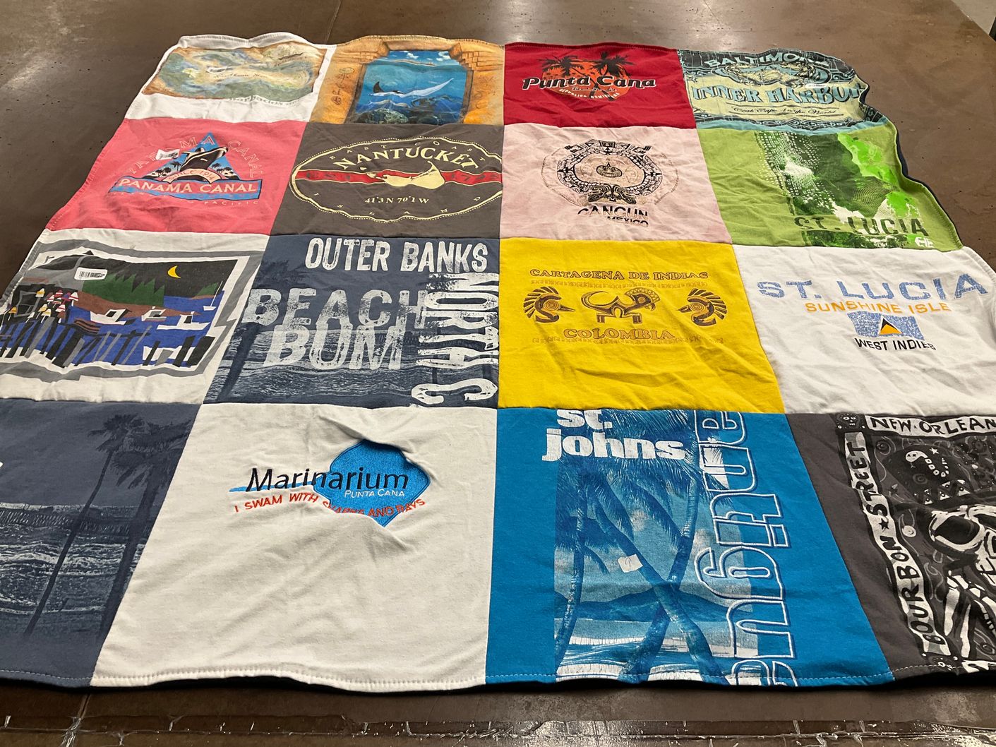 T-shirt quilt with travel, beaches themes by Diann from VT