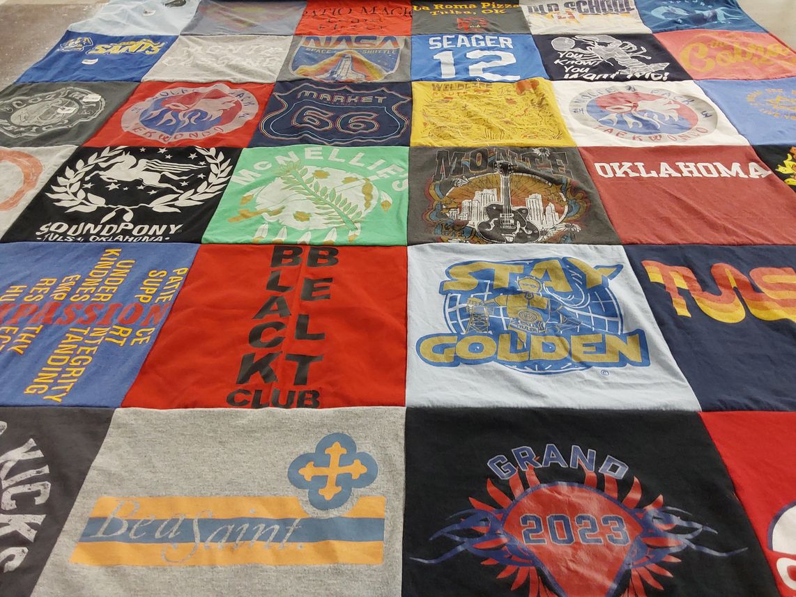 T-shirt quilt with music, community themes by Alicia from OK