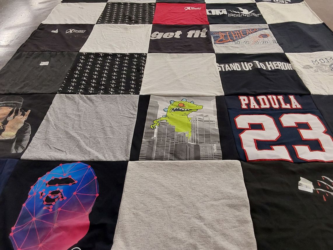T-shirt quilt with fitness, sports themes by Jennifer from IL