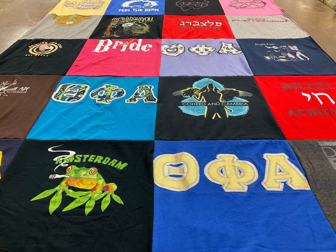 T-shirt quilt with music, politics themes by Emily from NC