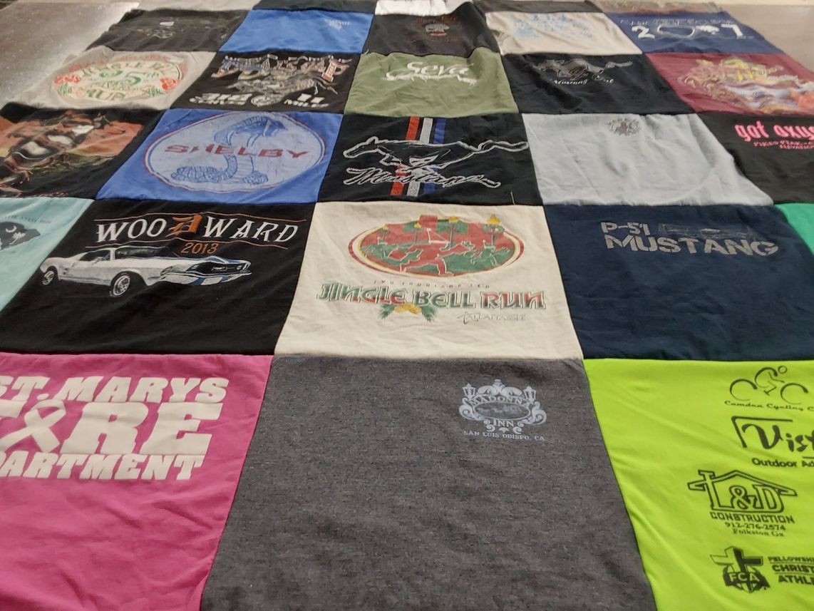 T-shirt quilt with cars, firefighting themes by Lisa from GA
