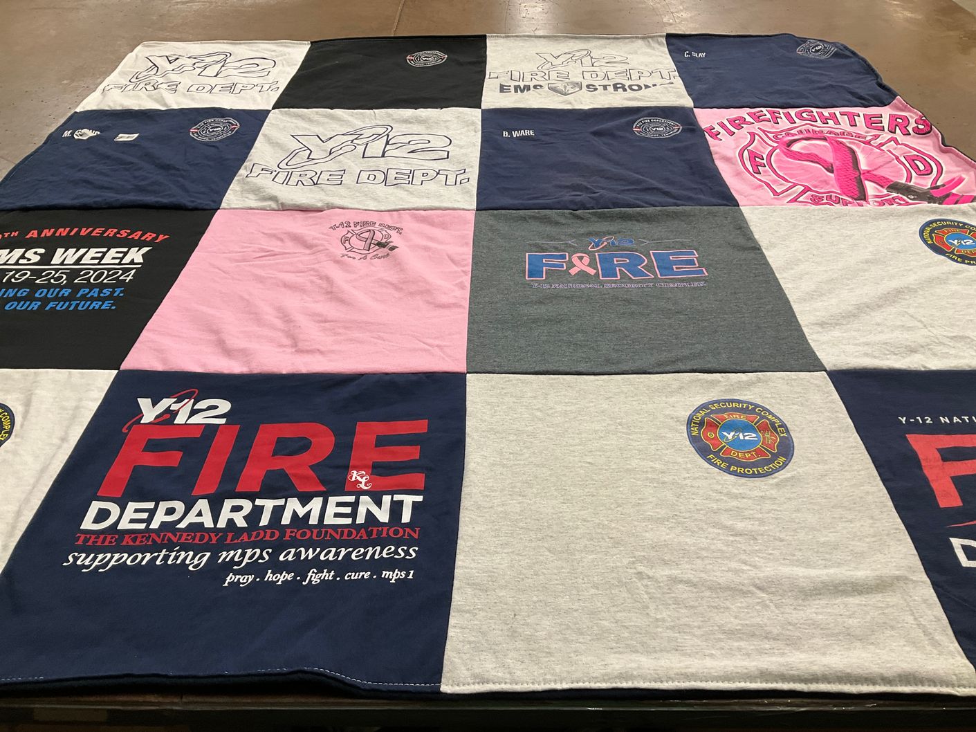 T-shirt quilt with firefighting, emergency services themes by Bryan from TN