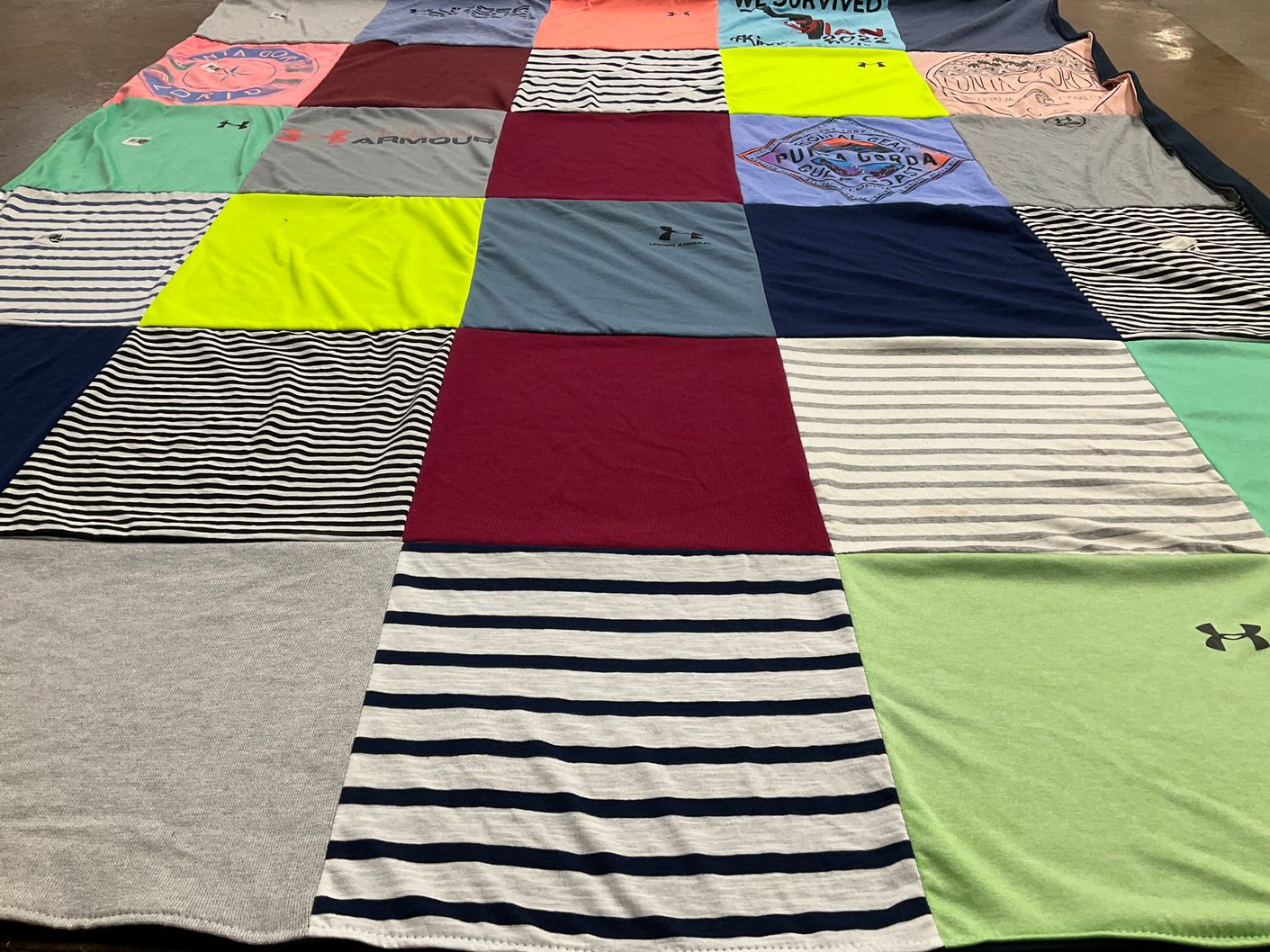 T-shirt quilt with sports, fashion themes by Ed from MA