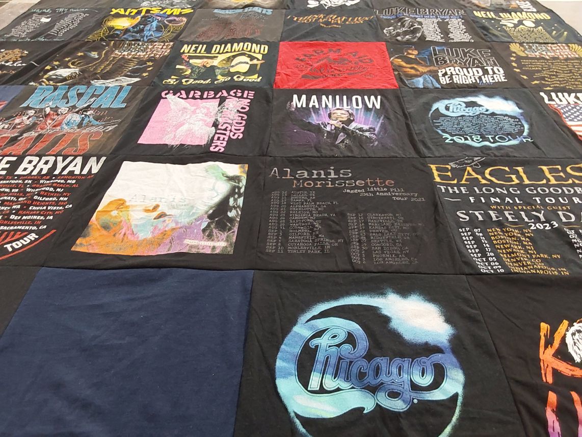 T-shirt quilt with music, concerts themes by Kati from IN