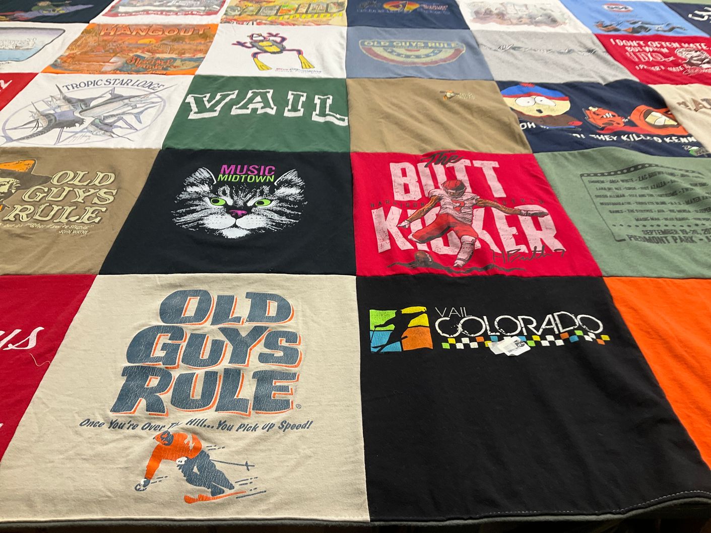 T-shirt quilt with skiing, music themes by Jackie from GA