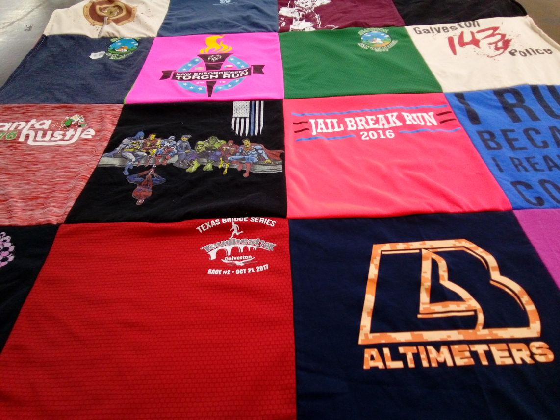T-shirt quilt with running, law enforcement themes by Holly from TX