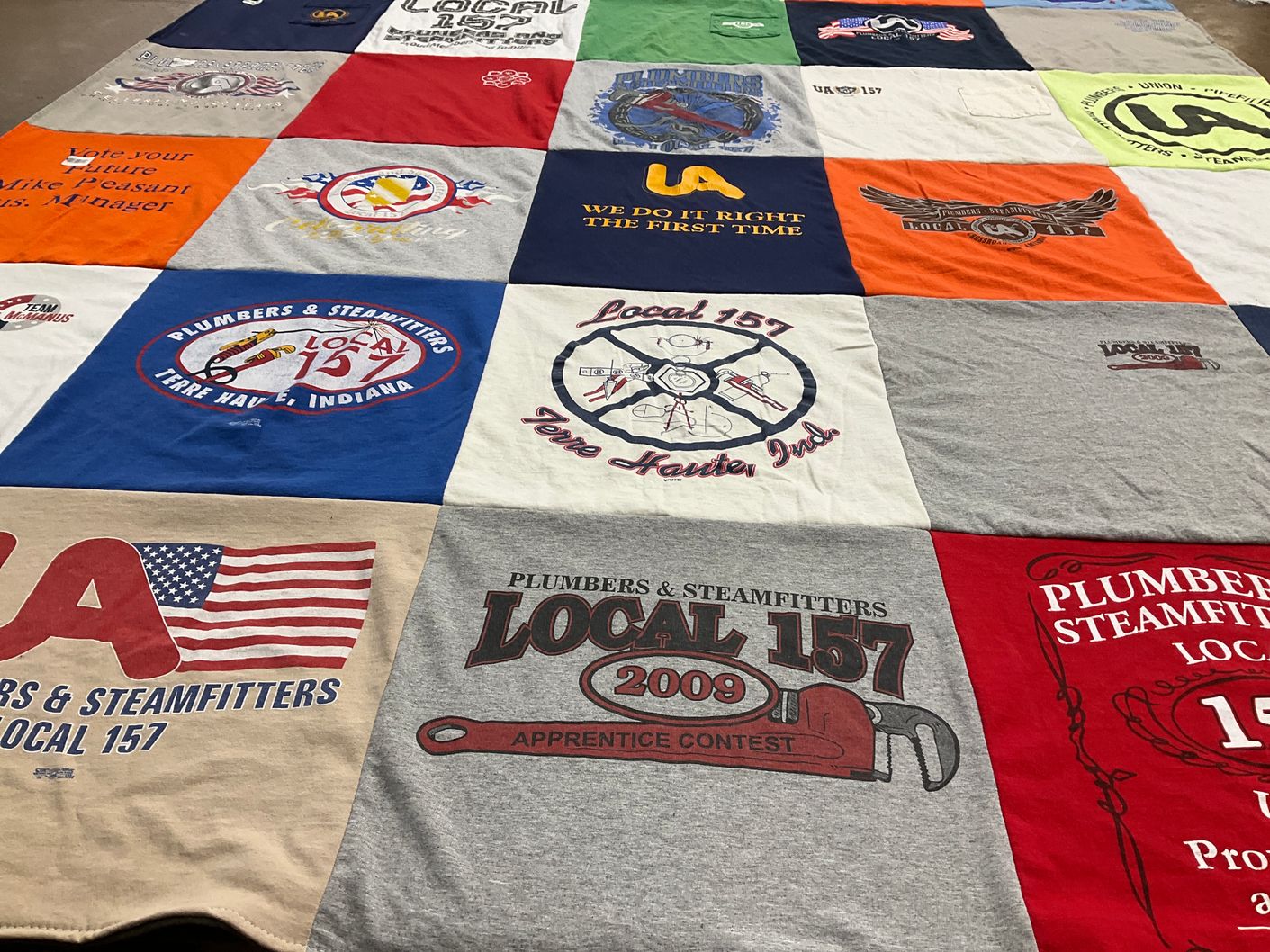 T-shirt quilt with trade, unions themes by Robin from MD