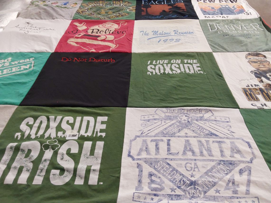 T-shirt quilt with adventure, family reunion themes by Theresa from IL
