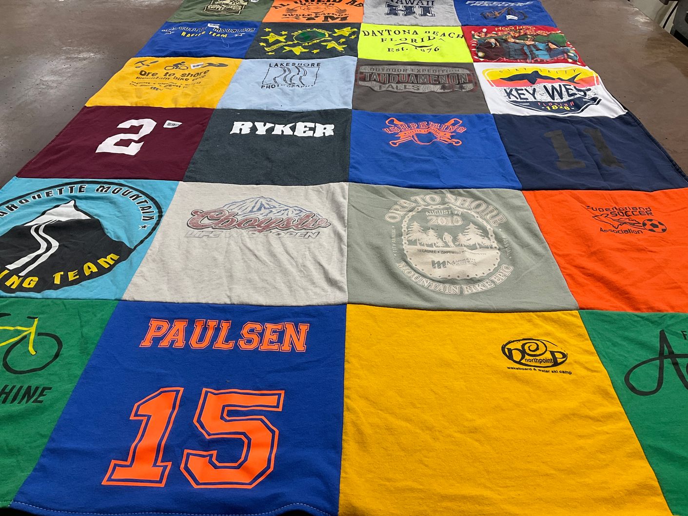T-shirt quilt with biking, camping themes by Jason from MI