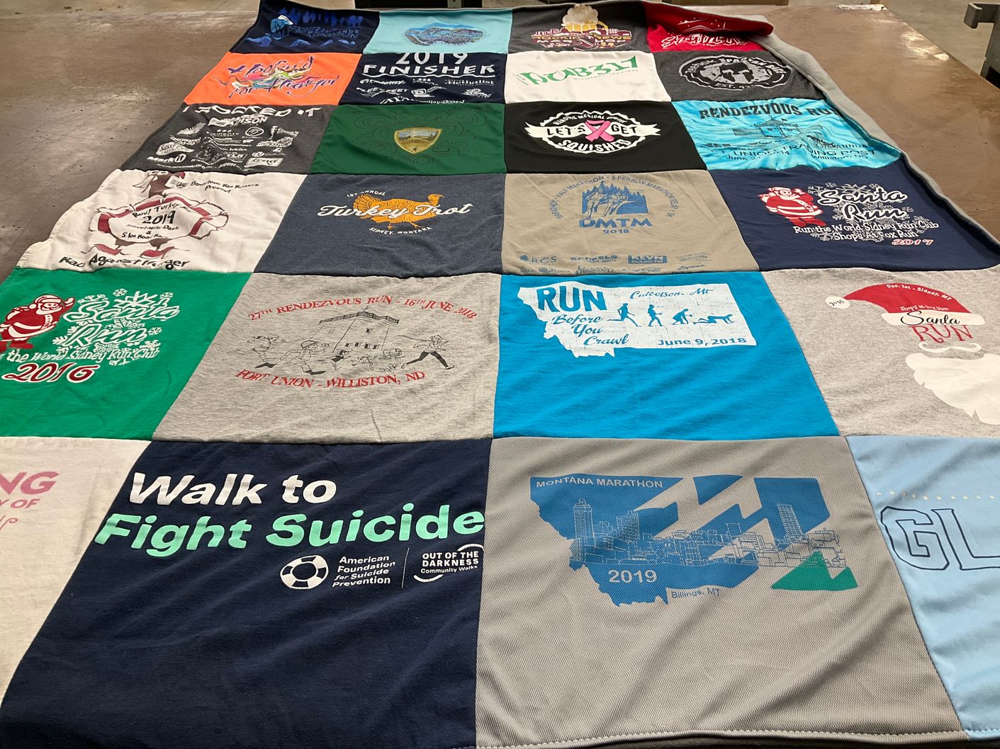 T-shirt quilt with running, fundraising themes by Megan from MT