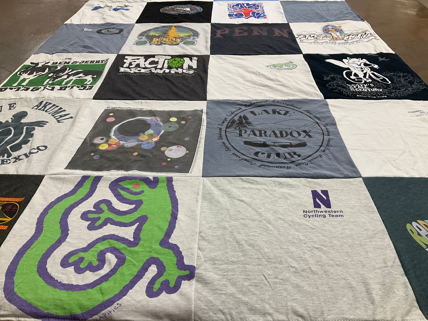 T-shirt quilt featuring northwestern cycling team by Tom from CA