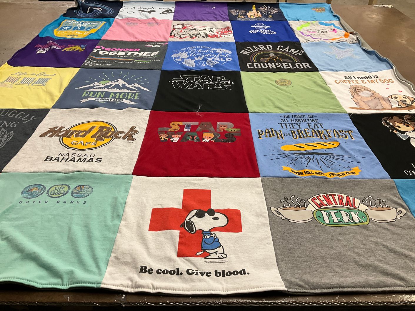 T-shirt quilt with travel, food themes by Cindy from MD