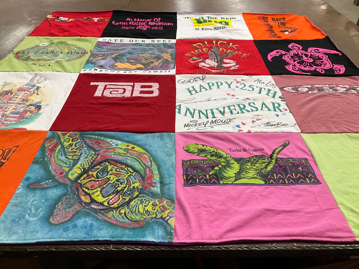 T-shirt quilt with marine conservation, celebrations themes by Holly from MD
