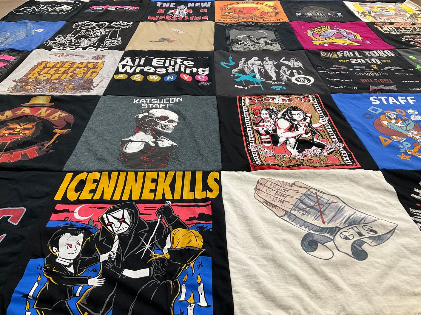 T-shirt quilt with music, wrestling themes by Jason from NJ