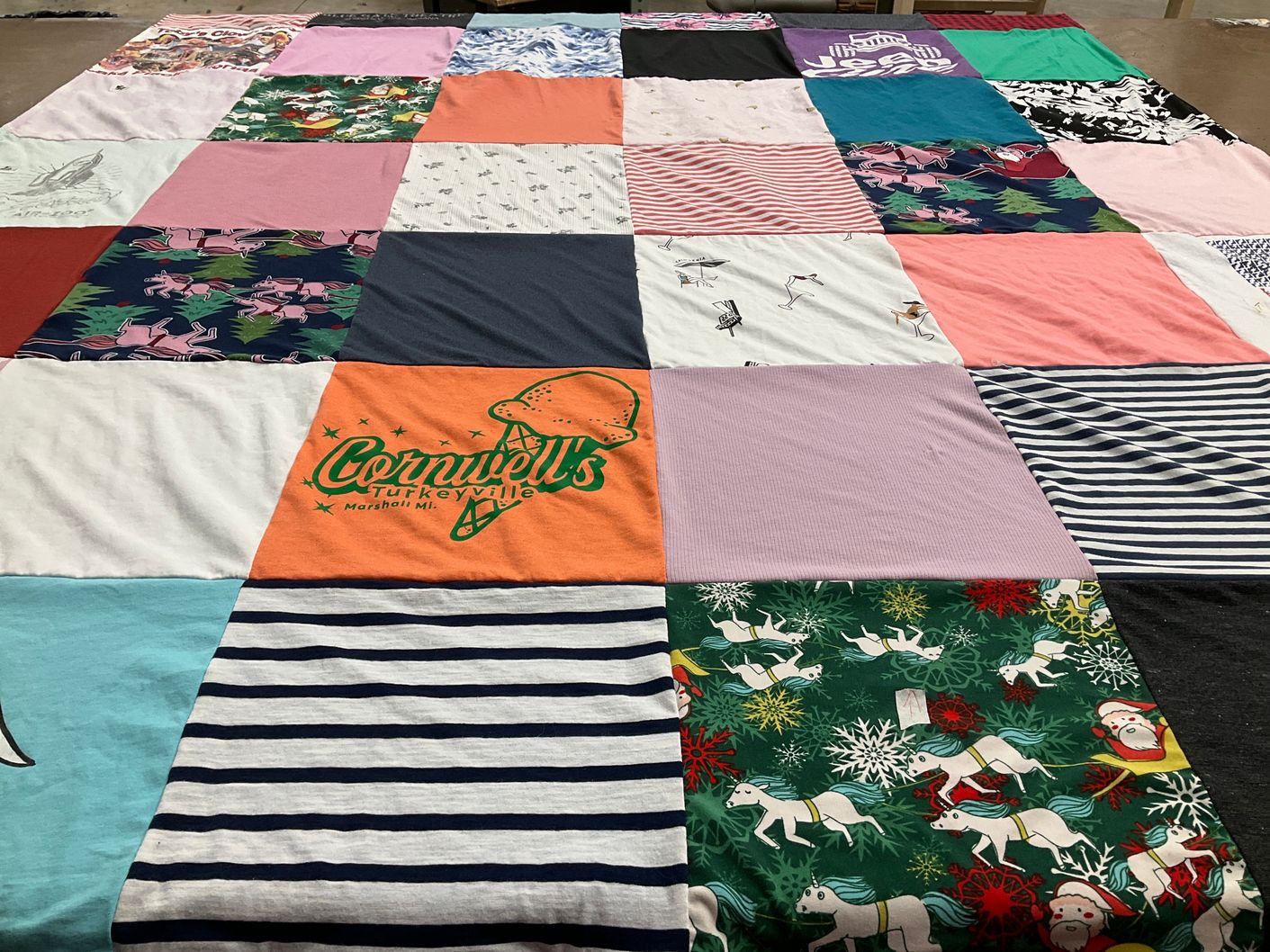 T-shirt quilt with festivals, local attractions themes by Lorena from MI