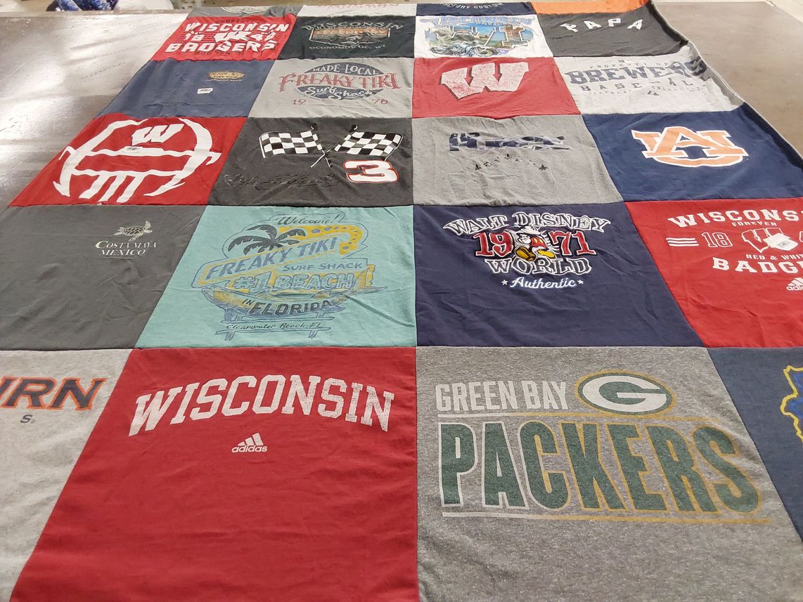 T-shirt quilt featuring university of wisconsin badgers, green bay packers by Barbara from WI