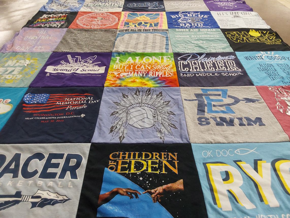 T-shirt quilt featuring pacer basketball, enid middle school swim by Laurie from OK