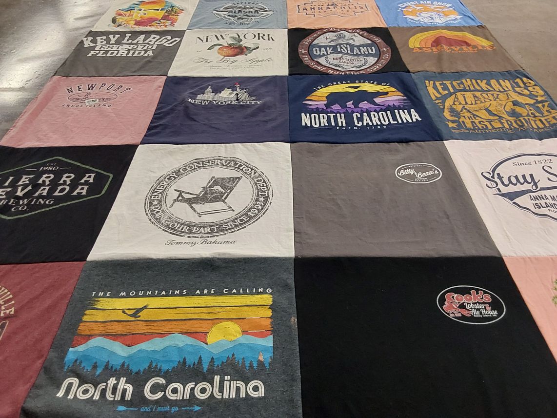 T-shirt quilt with travel, outdoors themes by Lisa from NC