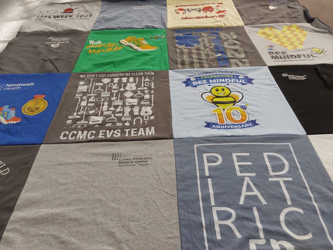 T-shirt quilt with healthcare, children's services themes by Vasilios from NY